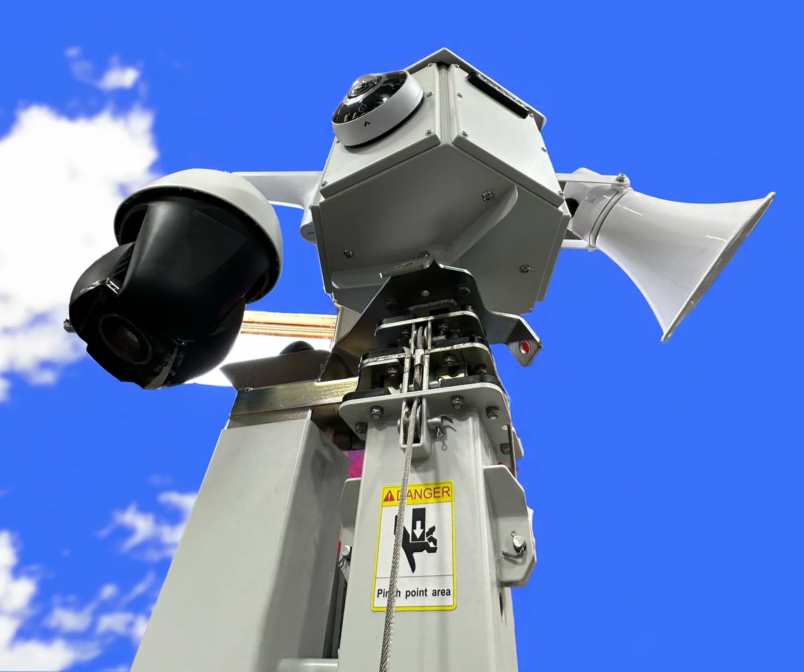 Camera head at the top of the mast with a PTZ camera, a fixed camera, and a horn speaker